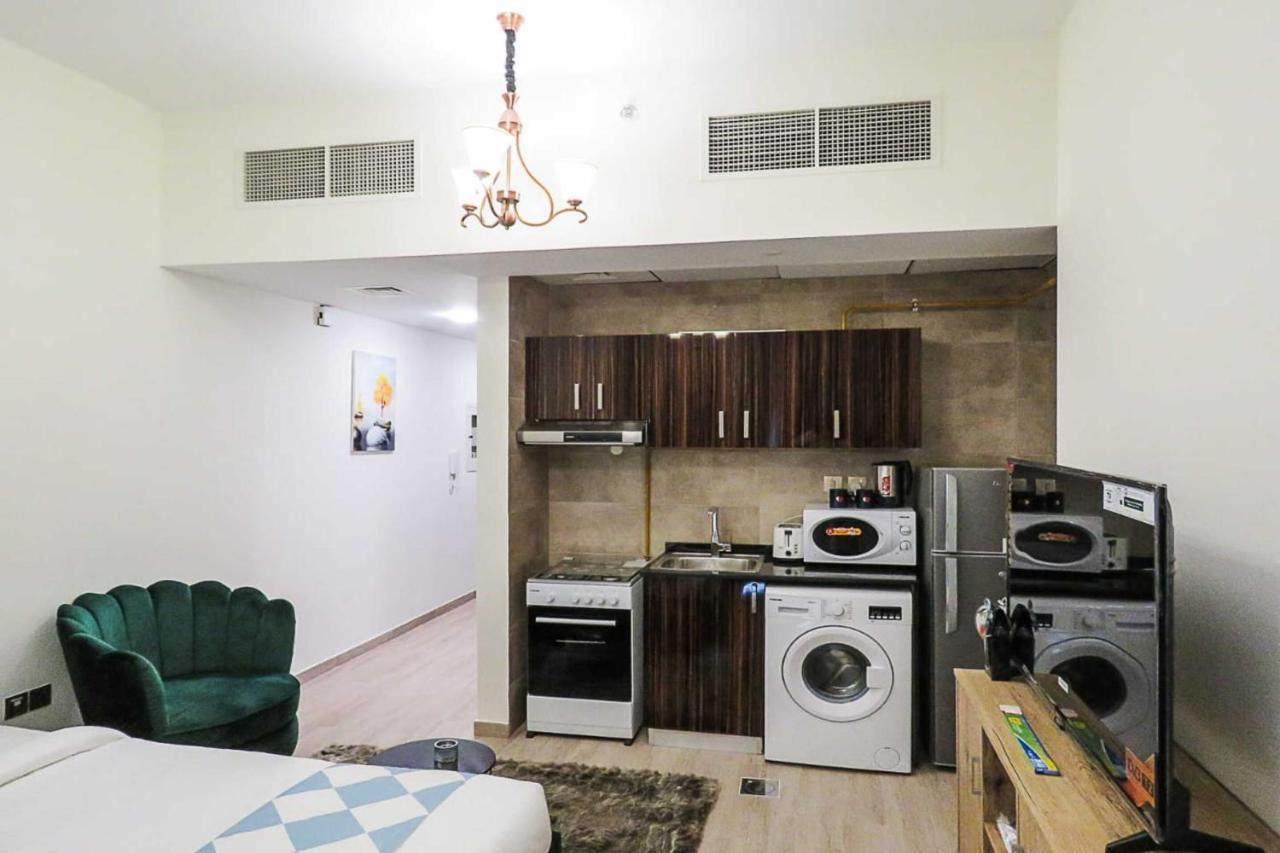 Oyo 860 Studio Apartment, Maya Tower 4, Jumeirah Village Triangle Dubai Exterior foto